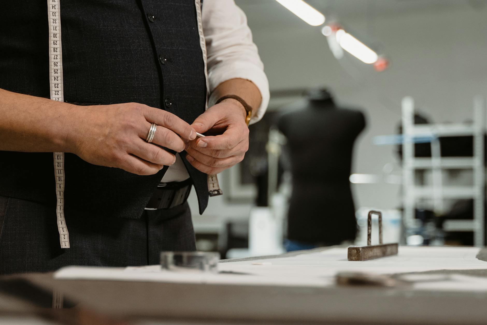 tailor holding a tailor s chalk