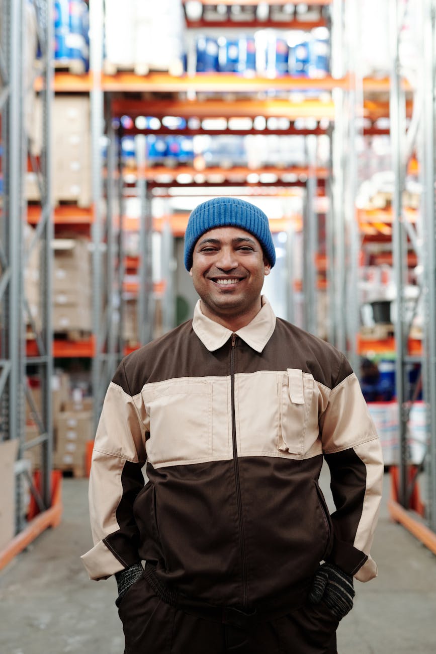 photo of man wearing blue bonnet smiling
