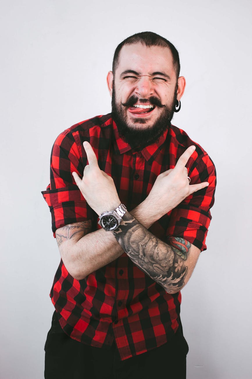man wearing plaid dress shirt